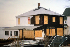 house boarded up after fire